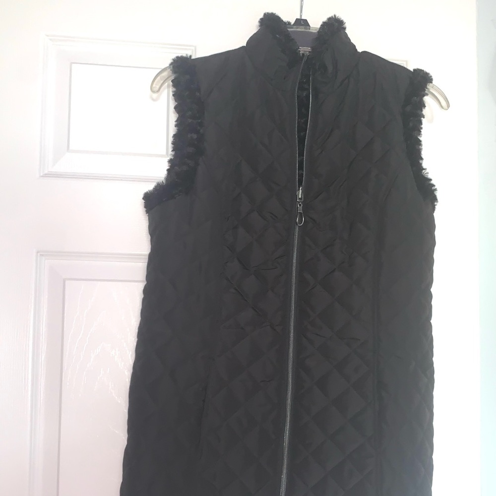 All Black vest with a furry black interior size small